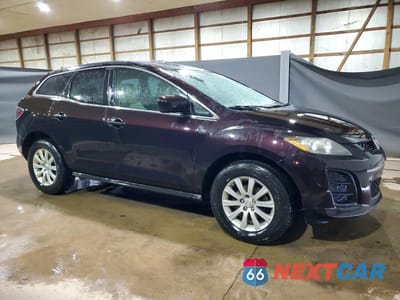 Czwarte zdjęcie samochodu z boku: 2011 MAZDA CX-7 VIN:JM3ER2BMXB0373614 - miniatura