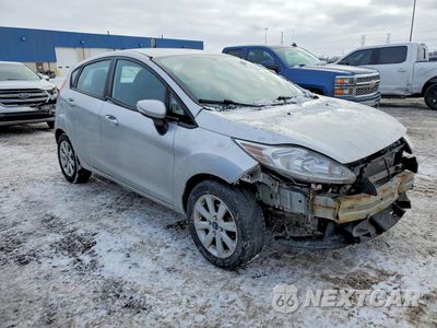 Czwarte zdjęcie samochodu z boku: 2013 FORD FIESTA SE VIN:3FADP4EJ8DM132115 - miniatura