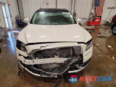 Piąte zdjęcie samochodu w środku: 2019 LINCOLN NAUTILUS RESERVE VIN:2LMPJ8LP1KBL39449 - miniatura