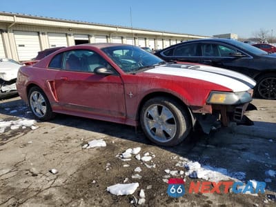 Czwarte zdjęcie samochodu z boku: 2002 FORD MUSTANG VIN:1FAFP40462F207613 - miniatura