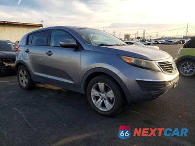 Czwarte zdjęcie samochodu z boku: 2012 KIA SPORTAGE VIN:KNDPB3A25C7319108 - miniatura