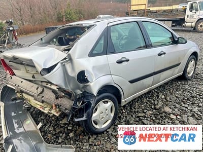 Trzecie zdjęcie samochodu z tyłu: 2001 FORD FOCUS LX VIN:1FAFP33P71W151227 - miniatura