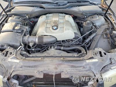 Zdjęcie 11 z 11 samochodu: 2004 BMW 745 LI VIN:WBAGN63584DS51886 - miniatura