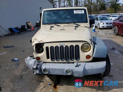 Piąte zdjęcie samochodu w środku: 2011 JEEP WRANGLER UNLIMITED SPORT VIN:1J4BA3H11BL579547 - miniatura