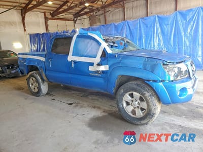 Czwarte zdjęcie samochodu z boku: 2011 TOYOTA TACOMA DOUBLE CAB VIN:3TMLU4EN3BM067902 - miniatura