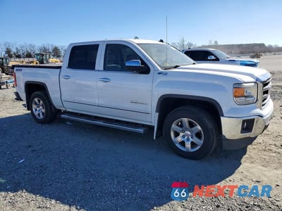 Czwarte zdjęcie samochodu z boku: 2014 GMC SIERRA K1500 SLT VIN:3GTU2VEC4EG142088 - miniatura