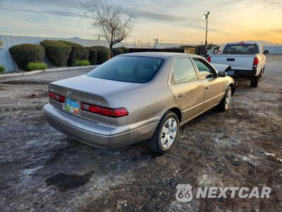 Trzecie zdjęcie samochodu z tyłu: 1999 TOYOTA CAMRY CE VIN:4T1BG22K5XU522118 - miniatura