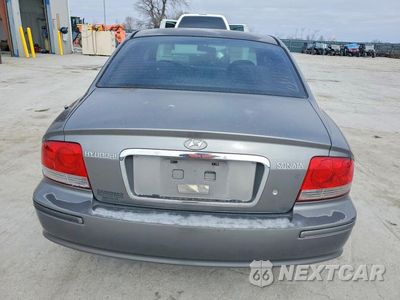 Zdjęcie 6 z 11 samochodu: 2002 HYUNDAI SONATA BASE VIN:KMHWF25HX2A719980 - miniatura