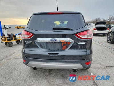 Zdjęcie 6 z 13 samochodu: 2014 FORD ESCAPE TITANIUM VIN:1FMCU0JX4EUD80212 - miniatura