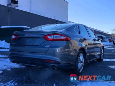 Czwarte zdjęcie samochodu z boku: 2013 FORD FUSION SE VIN:3FA6P0HR8DR347788 - miniatura