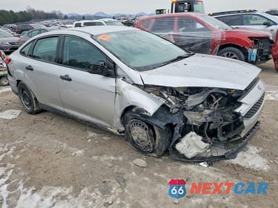 Czwarte zdjęcie samochodu z boku: 2018 FORD FOCUS S VIN:1FADP3E28JL265442 - miniatura