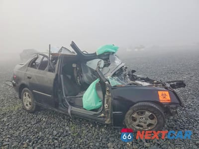 Czwarte zdjęcie samochodu z boku: 2002 HYUNDAI ACCENT GL VIN:KMHCG45C32U353942 - miniatura