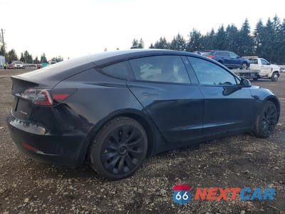 Trzecie zdjęcie samochodu z tyłu: 2022 TESLA MODEL 3 VIN:5YJ3E1EB5NF108105 - miniatura