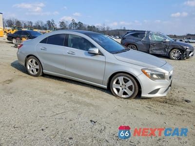 Czwarte zdjęcie samochodu z boku: 2015 MERCEDES-BENZ CLA 250 VIN:WDDSJ4EB8FN187836 - miniatura