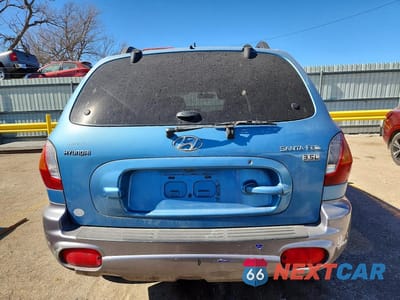 Zdjęcie 6 z 11 samochodu: 2004 HYUNDAI SANTA FE GLS VIN:KM8SC13EX4U726410 - miniatura