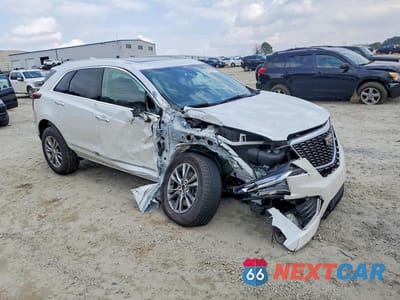 Czwarte zdjęcie samochodu z boku: 2022 CADILLAC XT5 PREMIUM LUXURY VIN:1GYKNCRS4NZ170259 - miniatura