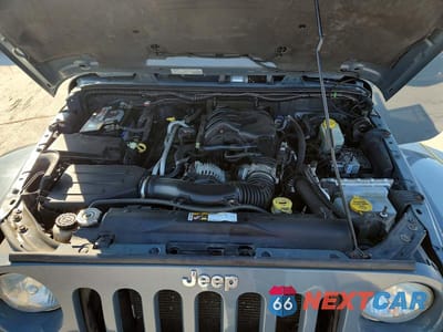 Zdjęcie 12 z 13 samochodu: 2014 JEEP WRANGLER UNLIMITED SAHARA VIN:1C4BJWEG0EL196980 - miniatura
