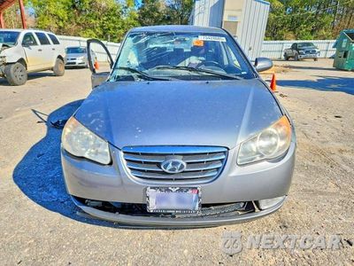 Piąte zdjęcie samochodu w środku: 2010 HYUNDAI ELANTRA BLUE VIN:KMHDU4AD0AU185560 - miniatura