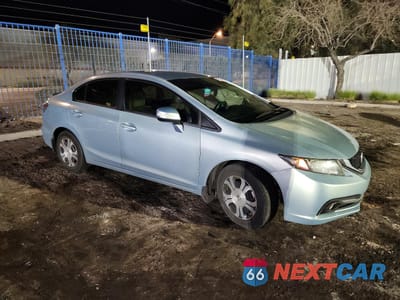 Czwarte zdjęcie samochodu z boku: 2013 HONDA CIVIC HYBRID VIN:19XFB4F21DE000297 - miniatura