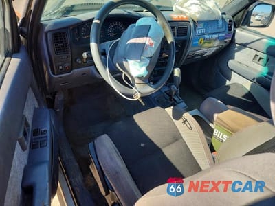 Zdjęcie 8 z 11 samochodu: 2000 TOYOTA TACOMA XTRACAB VIN:4TAWN72N3YZ672392 - miniatura