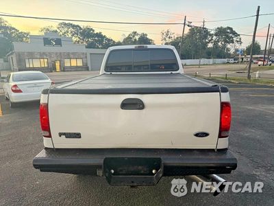 Zdjęcie 14 z 14 samochodu: 2004 FORD F350 SRW SUPER DUTY VIN:1FTSW31P74ED34393 - miniatura