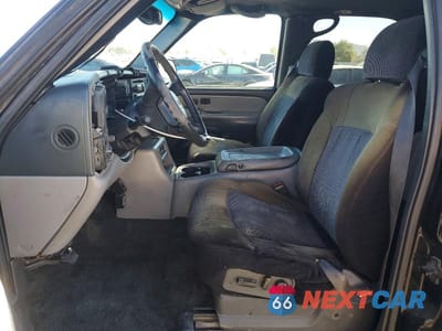 Zdjęcie 7 z 13 samochodu: 2001 CHEVROLET TAHOE C1500 VIN:1GNEC13T01J120621 - miniatura