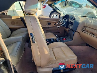 Zdjęcie 7 z 11 samochodu: 1999 BMW 323 IC AUTOMATIC VIN:WBABJ8336XEM26019 - miniatura