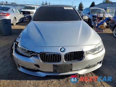Piąte zdjęcie samochodu w środku: 2015 BMW 335 XI VIN:WBA3B9C53FF589292 - miniatura