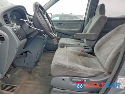 Zdjęcie 7 z 12 samochodu: 2002 HONDA ODYSSEY EX VIN:2HKRL18682H545172 - miniatura