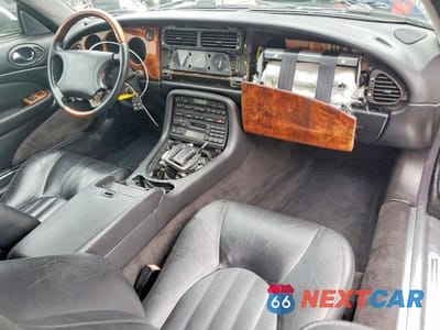 Zdjęcie 8 z 11 samochodu: 1999 JAGUAR XK8 VIN:SAJGX2041XC035598 - miniatura