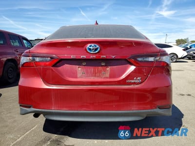 Zdjęcie 6 z 13 samochodu: 2021 TOYOTA CAMRY HYBRID LE VIN:4T1C31AK3MU022434 - miniatura