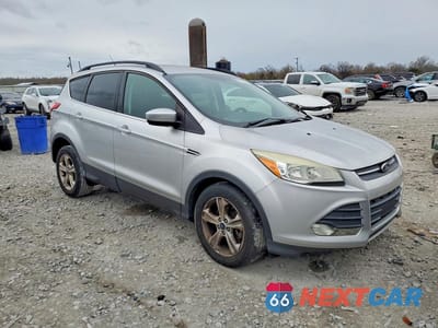 Czwarte zdjęcie samochodu z boku: 2014 FORD ESCAPE SE VIN:1FMCU9GX1EUE45139 - miniatura