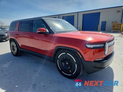 Czwarte zdjęcie samochodu z boku: 2025 RIVIAN R1S ADVENTURE VIN:7PDSGBBA8SN049869 - miniatura