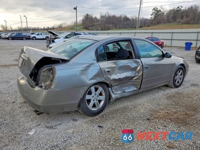 Trzecie zdjęcie samochodu z tyłu: 2002 NISSAN ALTIMA 2.5 VIN:1N4AL11D82C262343 - miniatura