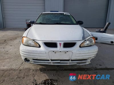 Piąte zdjęcie samochodu w środku: 1999 PONTIAC GRAND AM SE VIN:1G2NE52E2XC508402 - miniatura