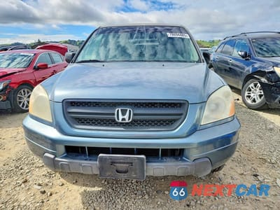 Piąte zdjęcie samochodu w środku: 2005 HONDA PILOT LX VIN:2HKYF18145H557606 - miniatura