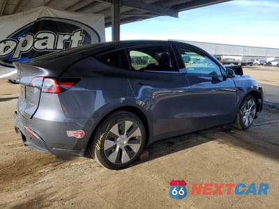 Trzecie zdjęcie samochodu z tyłu: 2023 TESLA MODEL Y VIN:7SAYGDEE0PF620291 - miniatura