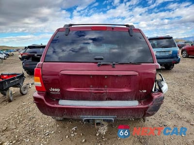 Zdjęcie 6 z 11 samochodu: 2001 JEEP GRAND CHEROKEE LIMITED VIN:1J4GW58NX1C739980 - miniatura