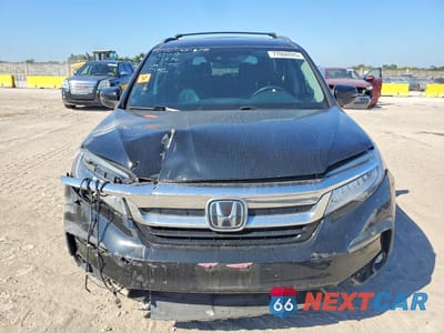 Piąte zdjęcie samochodu w środku: 2022 HONDA PILOT TOURING VIN:5FNYF5H90NB015415 - miniatura