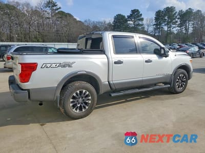 Trzecie zdjęcie samochodu z tyłu: 2019 NISSAN TITAN SV VIN:1N6AA1E58KN502270 - miniatura