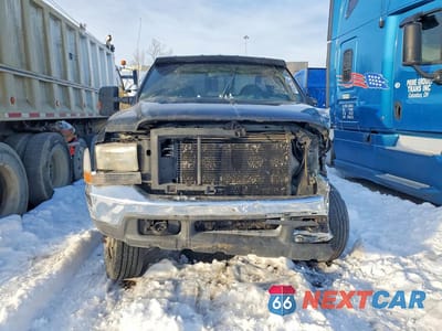 Piąte zdjęcie samochodu w środku: 1999 FORD F450 SUPER DUTY ROLLBACK TRUCK VIN:1FDXF46F1XEE96130 - miniatura