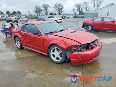 Czwarte zdjęcie samochodu z boku: 2000 FORD MUSTANG GT VIN:1FAFP42X1YF274040 - miniatura