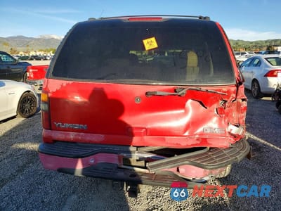 Zdjęcie 6 z 13 samochodu: 2001 GMC YUKON K1500 VIN:1GKEC13T61J192744 - miniatura