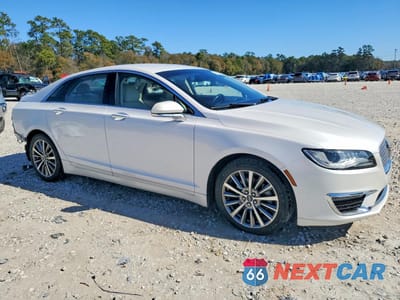 Czwarte zdjęcie samochodu z boku: 2019 LINCOLN MKZ VIN:3LN6L5A9XKR604410 - miniatura