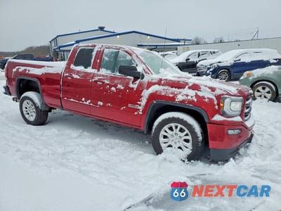Czwarte zdjęcie samochodu z boku: 2018 GMC SIERRA K1500 SLT VIN:1GTV2NEC4JZ340152 - miniatura