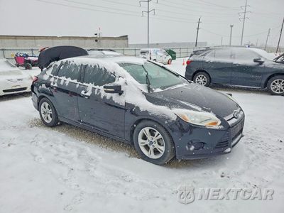 Czwarte zdjęcie samochodu z boku: 2014 FORD FOCUS SE VIN:1FADP3F21EL450372 - miniatura