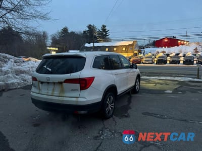 Czwarte zdjęcie samochodu z boku: 2016 HONDA PILOT EXL VIN:5FNYF6H83GB076046 - miniatura