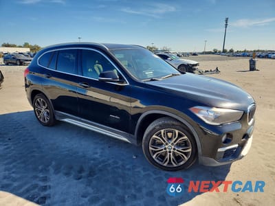 Czwarte zdjęcie samochodu z boku: 2017 BMW X1 XDRIVE28I VIN:WBXHT3C37H5F87044 - miniatura