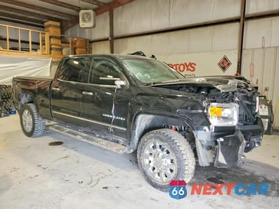 Czwarte zdjęcie samochodu z boku: 2019 GMC SIERRA K2500 DENALI VIN:1GT12SEY1KF175530 - miniatura