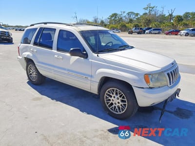 Czwarte zdjęcie samochodu z boku: 2003 JEEP GRAND CHEROKEE LIMITED VIN:1J4GW58N93C594434 - miniatura